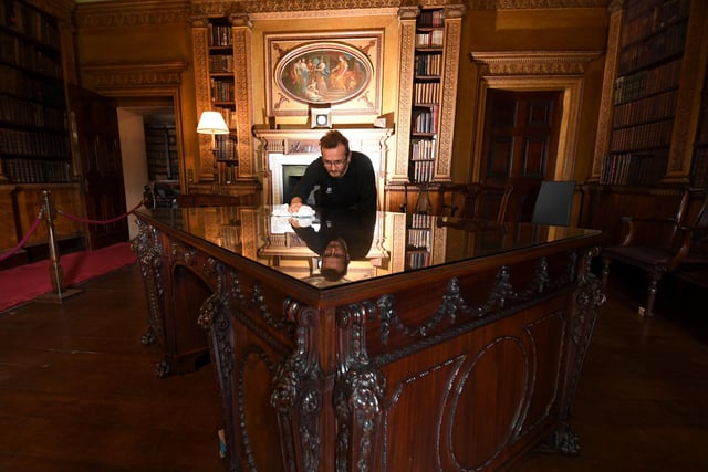 Cabinet maker Thomas Cippendale was born in Otley in the 18th century. The world-renowned craftsman gained a reputation for his designs and high-quality work, which became one of the most sought-after furniture brands during the 1700s. Pictured is curator Simon McCormack, polishing a library desk created by Thomas Chippendale, at Nostell Priory, Wakefield, in 2021.