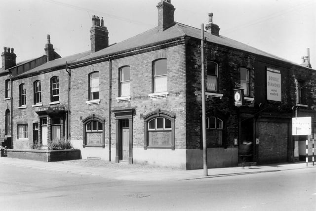 The Royal George Hotel at the corner of  Bruce Street and Wellington Road in Wortley with a smoke room to the left and vaults to the right. The landlord at this time was William P. A. Prendergast. This building was demolished as part of slum clearance plans. Pictured in June 1961.