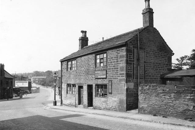 View looking across Morris Lane from the bottom of Kirkstall Hill, at the junction with Kirkstall Lane in May 1935. Number 1 Kirkstall Hill is home of Allan Lye, forgeman. Number 3 is a boot and shoe repair shop, business of John Arthur Stammers.