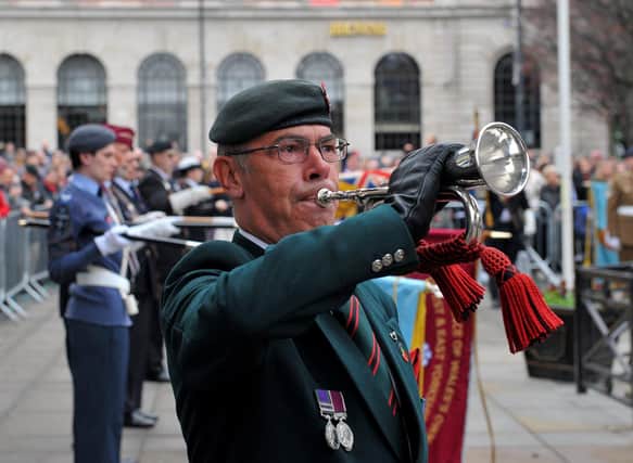 Pictured is bugler Craig Rosser at today's Remembrance Day parade and service at The War Memorial.