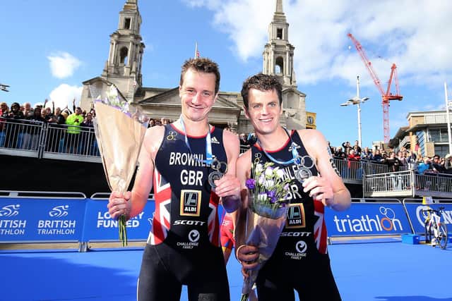 LEEDS, ENGLAND - JUNE 11:  Alastair Brownlee (L) winner and Jonathan Brownlee second of Britain pose for a picture after the Columbia Threadneedle World Triathlon on June 11, 2017 in Leeds, England. (Photo by Nigel Roddis/Getty Images)