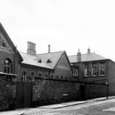 The buildings and rear entrances of Bewerley Street Infant School in June 1964. It was the first purpose built school to be built by Leeds School Board and opened its doors to pupils on August 8th, 1873. It has classrooms with large, arched windows and behind the high wall, toilets are situated. By the 1950s, the school was for Juniors (7 – 11 Years), the Infants having moved to a school on Hunslet Hall Road.