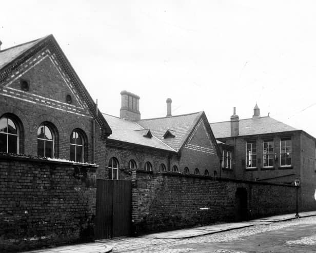 The buildings and rear entrances of Bewerley Street Infant School in June 1964. It was the first purpose built school to be built by Leeds School Board and opened its doors to pupils on August 8th, 1873. It has classrooms with large, arched windows and behind the high wall, toilets are situated. By the 1950s, the school was for Juniors (7 – 11 Years), the Infants having moved to a school on Hunslet Hall Road.
