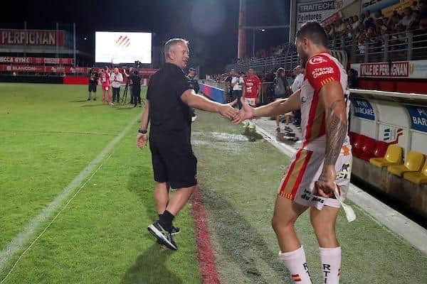 Catalans coach Steve McNamara shakes hands with player Joe Chan after last week's win over Leeds. Picture by Manuel Blondeau/SWpix.com.