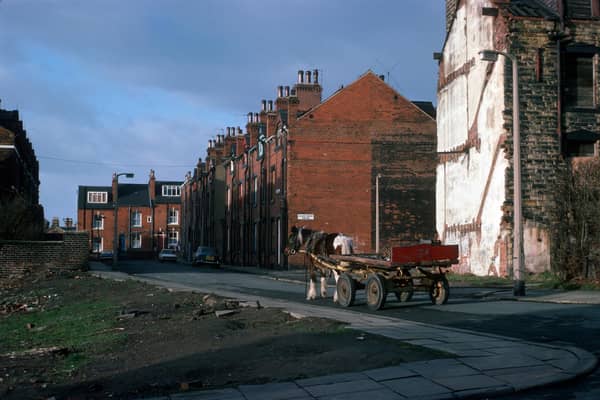 A horse and cart makes its way along Providence Road from the junction with Pennington Street.