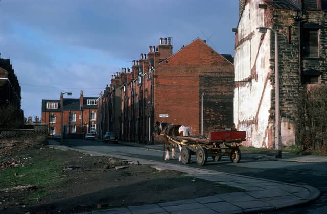A horse and cart makes its way along Providence Road from the junction with Pennington Street.