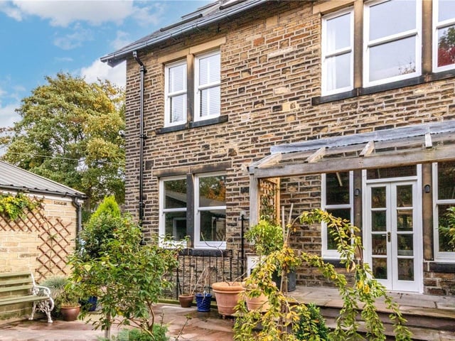 There's a paved and private rear garden with a good stock of plants and shrubs.