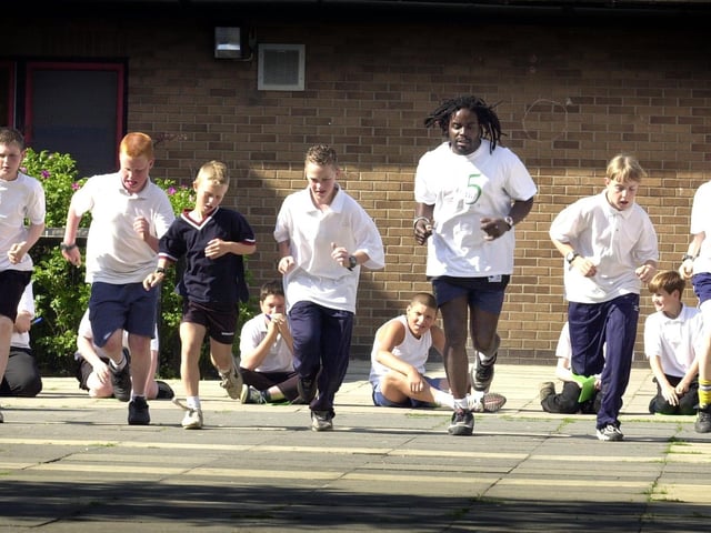 Sports co-ordinator Steve Walker puts pupils through their paces on the bleep test at Cockburn High School in June 2001. Staff from Leeds Leisure services measured the fitness levels of pupils at the start of the six week 'Slam It' health programme to compare the results at the end of the course.