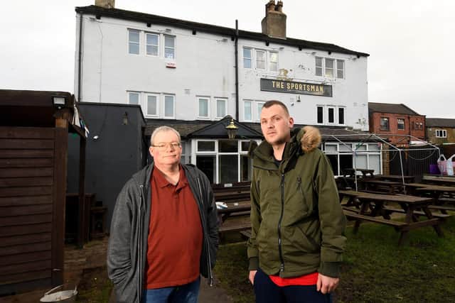 Former landlord David Holmes (right) and long serving customer Steve Hitchcock outside the Sportsman Inn in Morley. Picture by Simon Hulme
