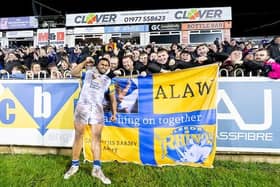 Leeds Rhinos'  Sam Lisone celebrates with fans after the win at Castleford Tigers. Picture by Allan McKenzie/SWpix.com.