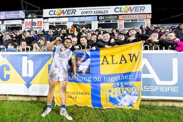 Leeds Rhinos' Sam Lisone celebrates with fans after the win at Castleford Tigers. Picture by Allan McKenzie/SWpix.com.