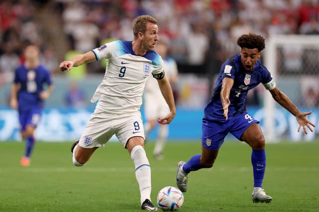 JOY FOR BOTH? Harry Kane, left, with England, and Leeds United's Tyler Adams, right, with the USA, are both looking to take their nations into the Qatar World Cup last 16 tonight. Photo by(Photo by Elsa/Getty Images)