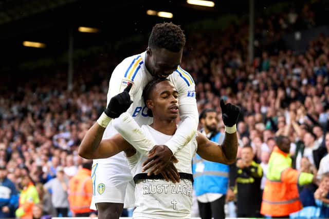 LEEDS, ENGLAND - AUGUST 06: Crysencio Summerville of Leeds United celebrates with his teammate Wilfried Gnonto after scoring his team's second goal during the Sky Bet Championship match between Leeds United and Cardiff City at Elland Road on August 06, 2023 in Leeds, England. (Photo by Alex Caparros/Getty Images)
