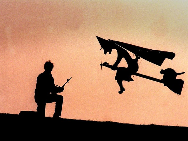 Aero-modeller Terry Lee, with his flying witch on Pontefract racecourse in March 1997.