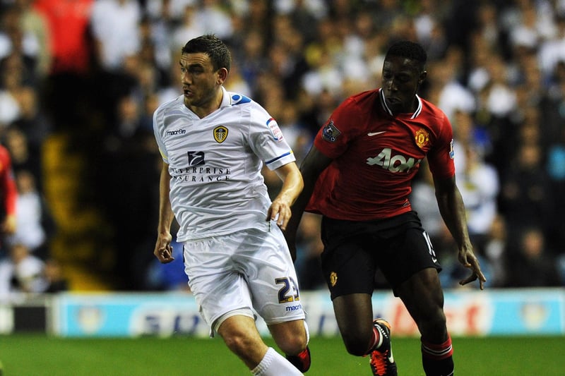 Robert Snodgrass (L) holds off Danny Welbeck of Manchester United during the Carling Cup Third Round match between Leeds United and Manchester United at Elland Road. (Photo by Gareth Copley/Getty Images)