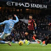 ON THE MARK: Bournemouth's Leeds United loanee Luis Sinisterra, right, scores for the Cherries in Saturday's Premier League clash at Manchester City.
Photo by PAUL ELLIS/AFP via Getty Images.