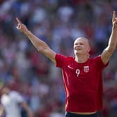 FALSE HOPE: As Erling Haaland celebrates putting Norway ahead from the penalty spot. Photo by HEIKO JUNGE/NTB/AFP via Getty Images.