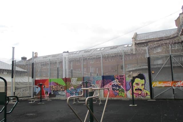 The report praised the murals and artwork that had been added to help deal with the 'forbidding appearance' of the old Victorian jail