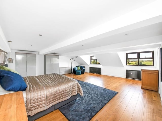 One of the property's six sizeable bedrooms.