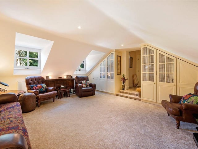 There is a spacious second bedroom with fitted wardrobes which is currently used by the owners as an upstairs sitting room.