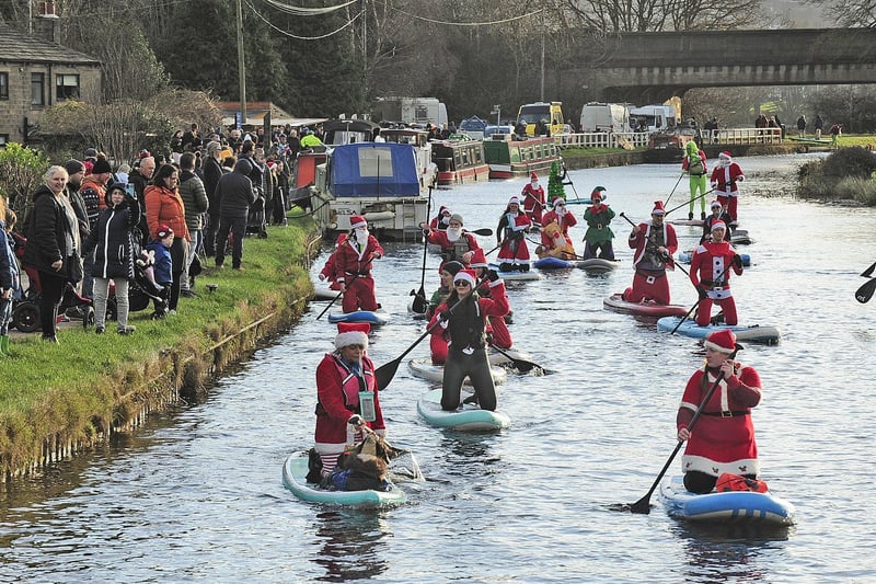 Members of the paddle community including Leeds Dock Paddle Boarding and White Rose Canoe Club at Rodley for the annual Big Paddle Community Santa Splash from Rodley to Apperley Bridge and back. (pic by Steve Riding)
