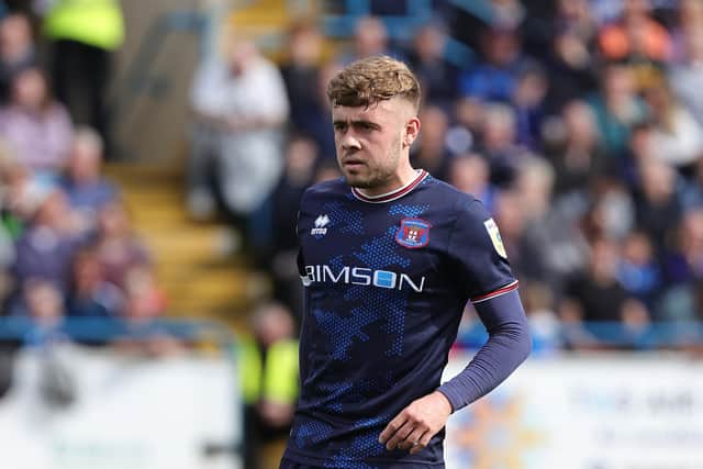 CARLISLE, ENGLAND - APRIL 15: Alfie McCalmont of Carlisle United in action during the Sky Bet League Two between Carlisle United and Northampton Town at Brunton Park on April 15, 2023 in Carlisle, England. (Photo by Pete Norton/Getty Images)