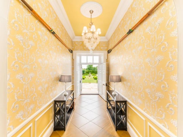 The generous proportions of the reception hall set the tone on arrival, immediately conveying the property's Georgian grandeur and architectural presence.