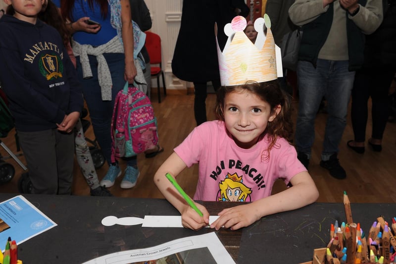 Maddison Honnor of Pontefract making a crown and a sword at the Royal Armouries.