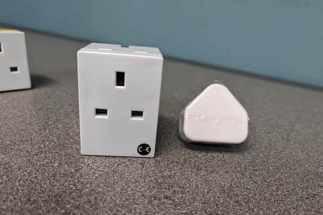 Featured on the shelves are plug sockets that have hidden cameras
