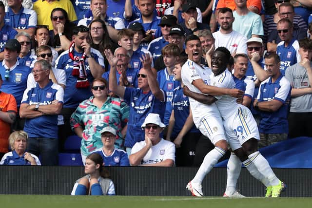 LIFT OFF: New Leeds United signing Joel Piroe, left, celebrates with the returning Willy Gnonto after putting the Whites 3-1 up at Ipswich Town on his debut.
Photo by George Tewkesbury/PA Wire.