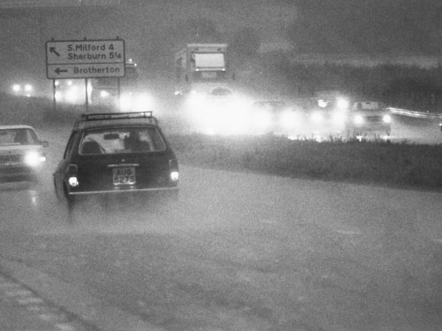 Day becomes night in August 1982. The scene at 5pm as traffic heads home through a thunderstorm on the A1 near Ferrybridge.
