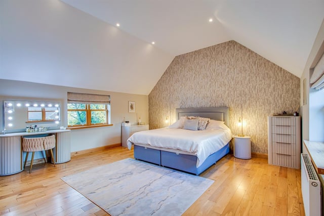 Bedrooms are spacious, and two have their own en suite shower rooms.