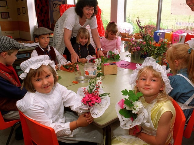 Kippax North Primary School held a Victorian day in July 1996. Pictured posy making are Sally Hickman and Sadie Biggs.