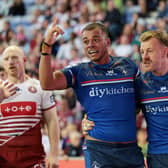 Corey Hall celebrates scoring a try at Wigan. Photo by John Clifton.