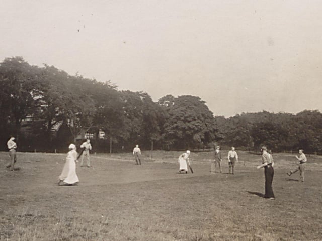 A game of cricket taking place in the grounds of Gledhow Hall in August 1915 while it was being used as a military hospital during the First World War. A team of nurses, seen here batting, are taking on a team of patients from the hospital.