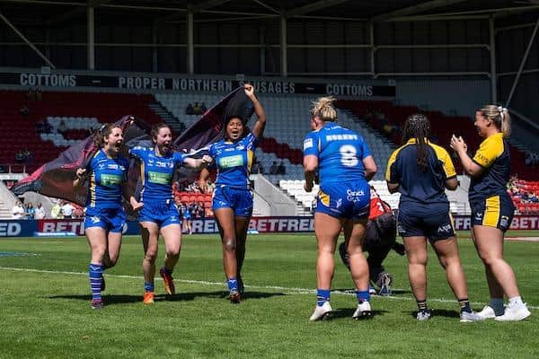 Izzy Northrop, Ella Donnelly, Sophie Robinson and Zoe Hornby celebrate Leeds Rhinos' return to Wembley after their Women's Challenge Cup semi-final win against Wigan Warriors. Picture by Olly Hassell/SWpix.com.