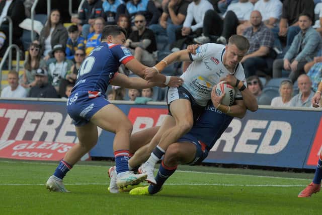 Ash Handley, who has signed a new long-term contract, seen in action for Leeds Rhinos against Wakefield Trinity in May. Picture by Steve Riding.