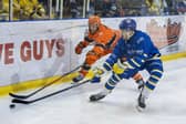 FAMILIAR FACES: Leeds Knights' Bailey Perre battles with Sheffield Steeldogs' Oliver Knaggs on New Year's Eve. The two teams meet on Thursday in the first leg of the NIHL National Cup Final. Picture: Tony Johnson.