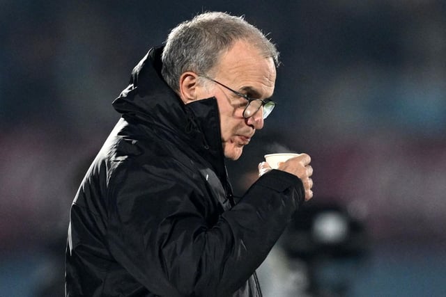 A familiar sight: Marcelo Bielsa supping a hot drink on the touchline. (Photo by EITAN ABRAMOVICH/AFP via Getty Images)