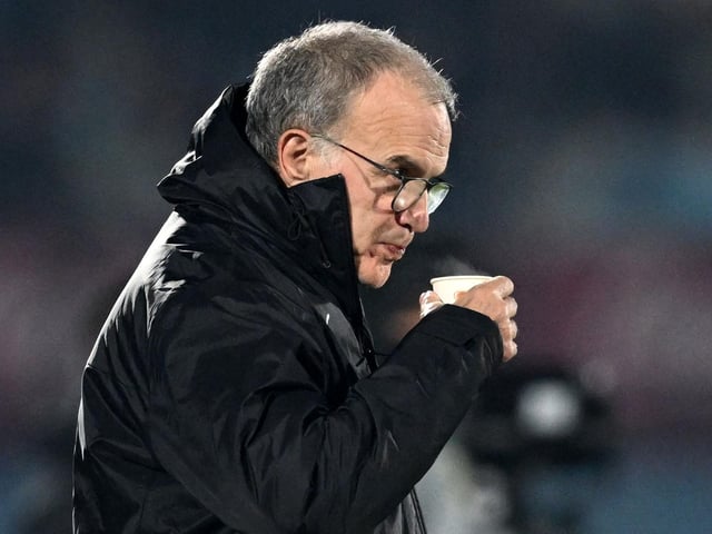 A familiar sight: Marcelo Bielsa supping a hot drink on the touchline. (Photo by EITAN ABRAMOVICH/AFP via Getty Images)