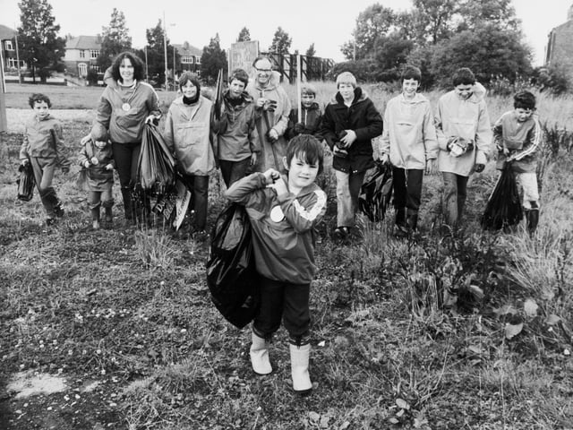 Members and officials of the Boy's Brigade Fifth Leeds Company at work during their clean up operation on Primrose Lane at Halton in August 1980. Young Ian Morley is pictured in the foreground.