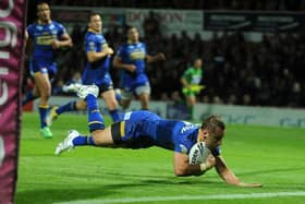 Rob Burrow scores for Leeds Rhinos aginst Castleford Tigers in 2011. Picture by Steve Riding.