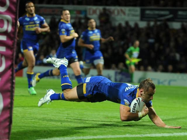 Rob Burrow scores for Leeds Rhinos aginst Castleford Tigers in 2011. Picture by Steve Riding.