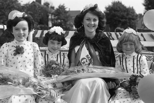 1977's Gala Queen after being presented with flowers