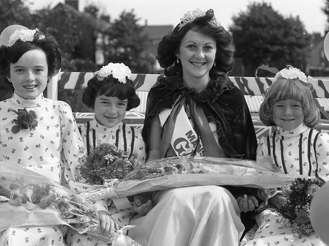 1977's Gala Queen after being presented with flowers