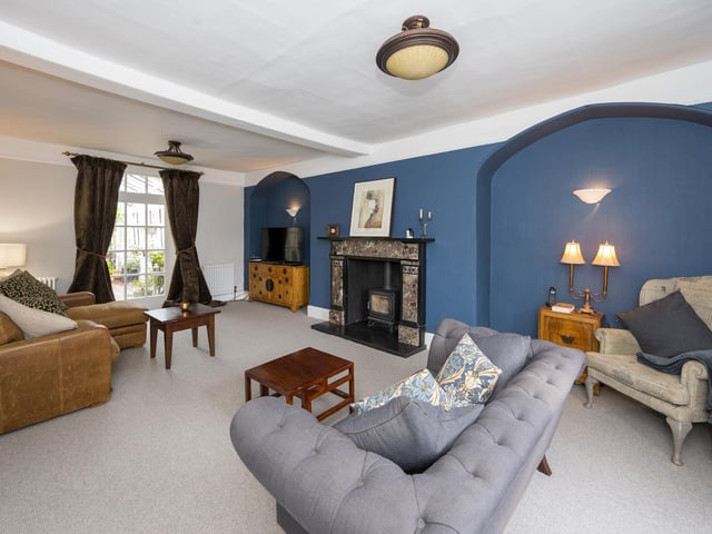 Another of the reception rooms that offer exceptional space and comfort within the property.