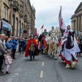 This year’s parade was led by a performer on horseback dressed as the legendary saint.