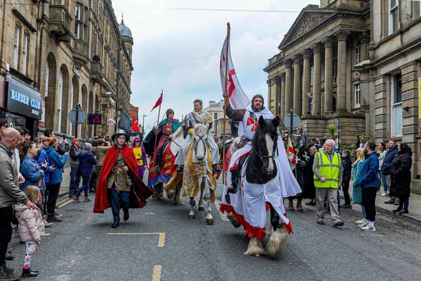 This year’s parade was led by a performer on horseback dressed as the legendary saint.