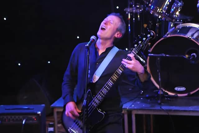 Robert Arkins on stage with The Commitments band - he starred as Jimmy Rabbitte in the hit movie.