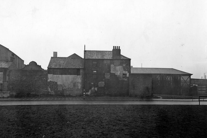 The north side of Marsh Lane looking at Marsh Lane tenements in December 1945. Hudson and Co. Ltd, (timber merchants), can just be seen on the right.